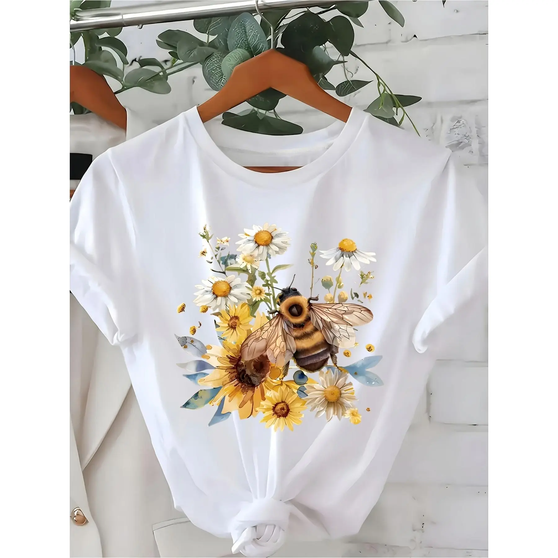 A Casual Short Sleeve T Shirt for Women Featuring a Bee Design And a Round Neckline Made from Breathable Machine Washable Material Perfect for Spring And Summer in White with Vibrant Yellow A Trendy streetwear style for fashion lovers