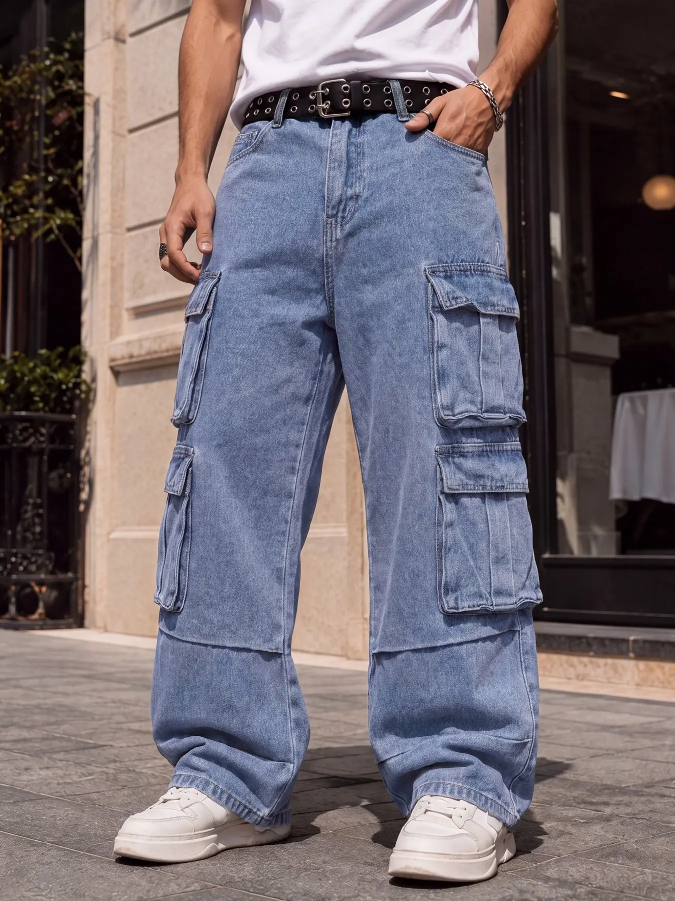 Men's blue loose wide-leg cargo denim pants, featuring a multi-pocket cargo design, creating an American Y2K street fashion look