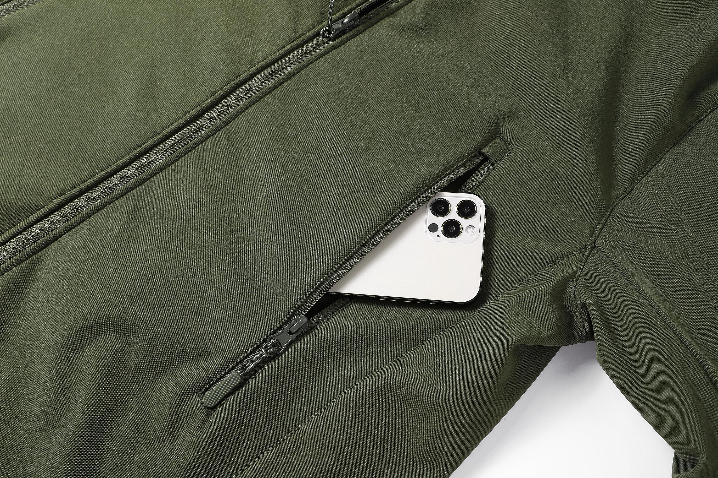 A men's hooded jacket with an outdoor and functional style features multiple zipper pockets distributed on the chest, arms, etc., making it convenient to store various small items and highly practical. Hood with drawstring closure