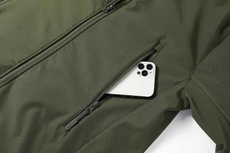 A men's hooded jacket with an outdoor and functional style features multiple zipper pockets distributed on the chest, arms, etc., making it convenient to store various small items and highly practical. Hood with drawstring closure