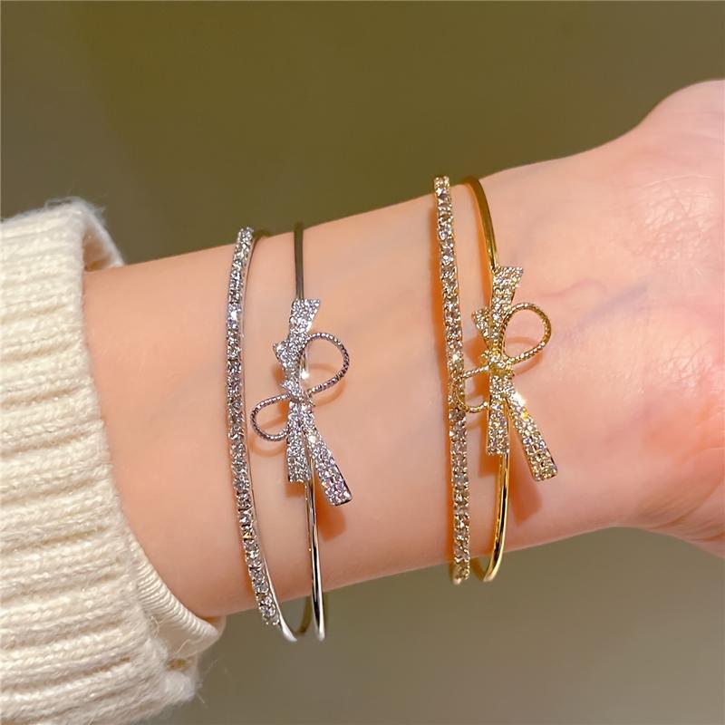 Elegant Gold Bow Bracelet with Synthetic Cubic Zirconia Inlay, Women's Open Design Bracelet for Casual and Special Occasions