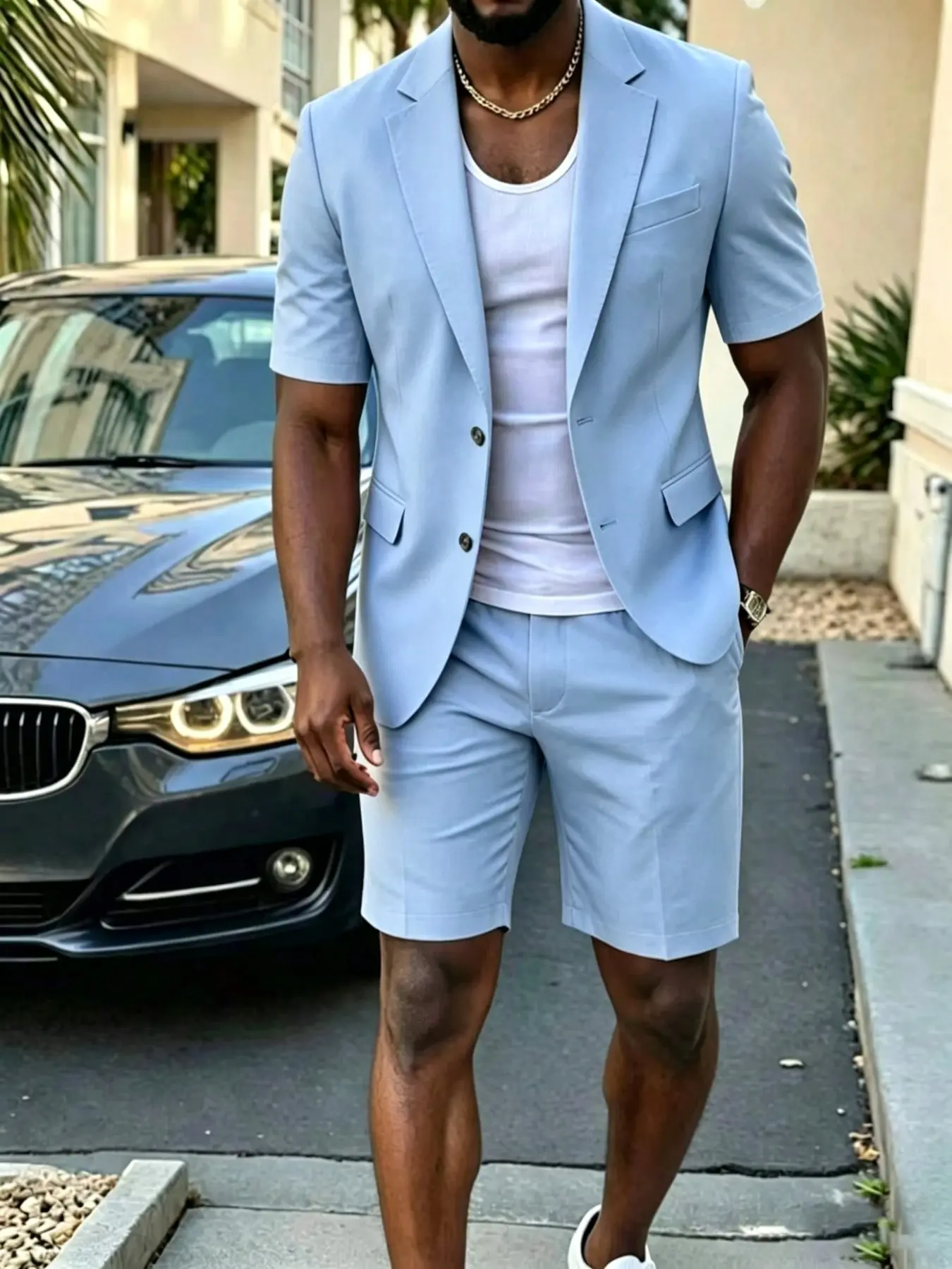 Short-sleeved suit set in summer blue—ideal for smart-casual, business-casual, or vacation wear. Features lightweight, breathable fabric and a relaxed fit that flatters all body types.