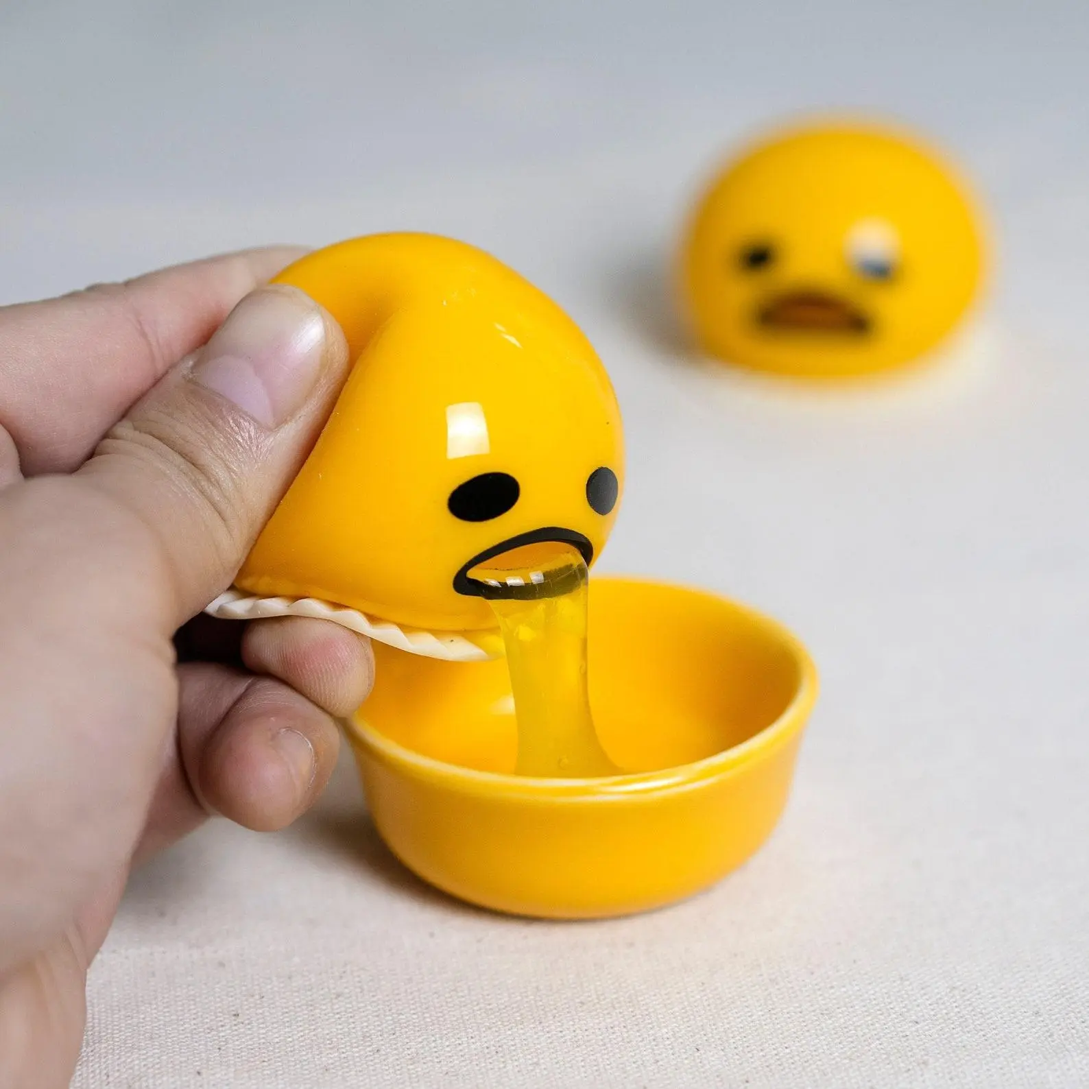 Gudetama Stress Relief Squeeze Toy – Puking Liquid Fidget Egg