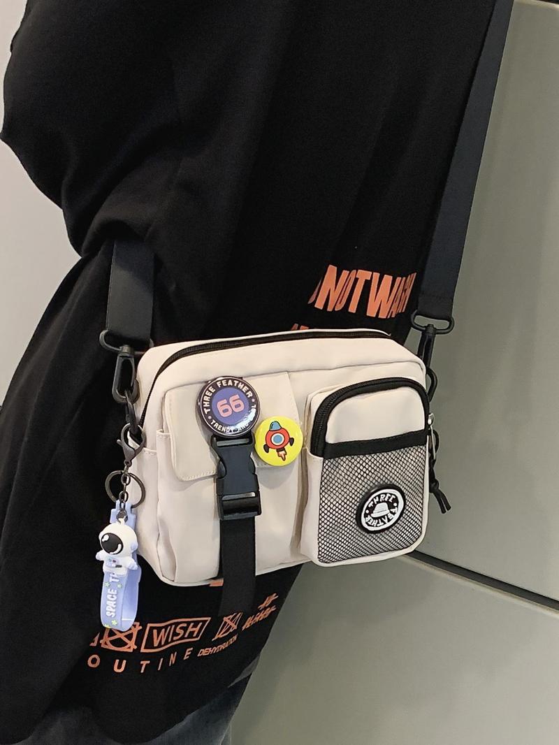 Unisex Casual Plain Color Release Buckle Crossbody Bag with Astronaut Charm, Fashionable Versatile Zipper Crossbody Bag with Random Color Badge, Trendy Shoulder Bag for Daily Use, Adjustable Crossbody Bag