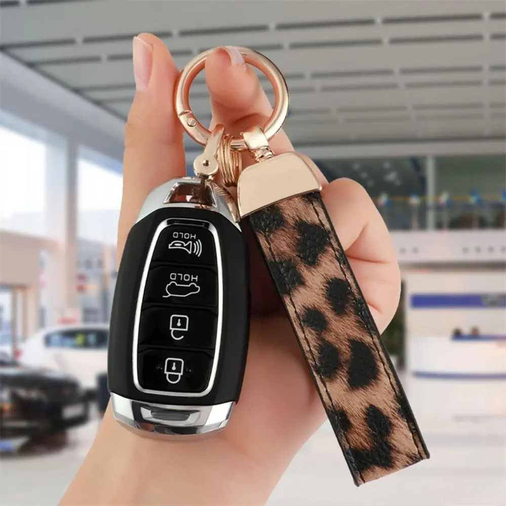 Women's Leather Wristlet Keychain, Coquette Leopard Print with Cherry Accent, Compact Key Fob Holder and Decorative Bag Charm, Leather Strap, Romantic, Anti-Tarnish Plating, Keychains For Women, Graphic