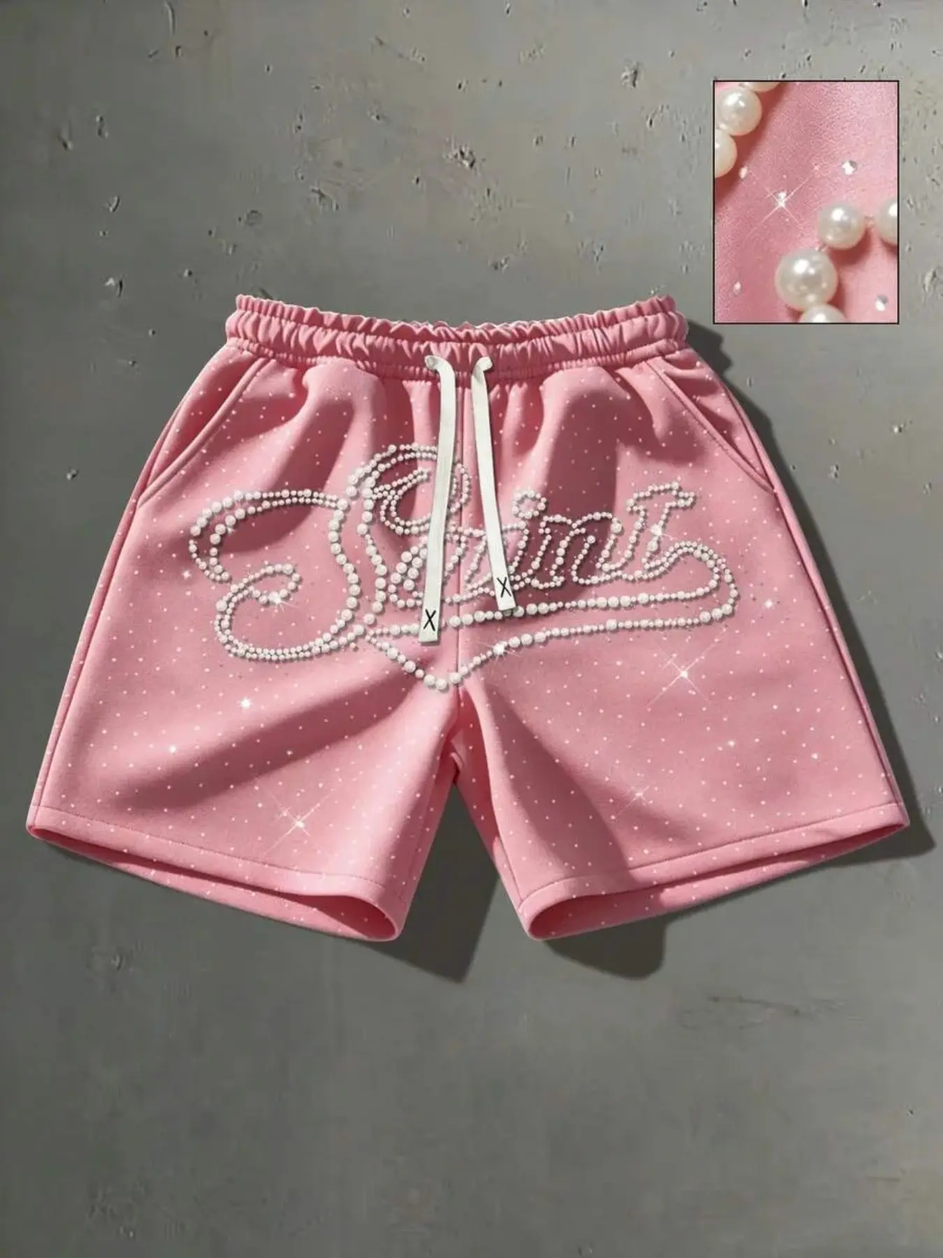 American-style light luxury drawstring men's shorts, with delicate shimmering pearls and handwritten slogans throughout. Elastic waist drawstring, unisex shorts, black, loose fit, casual street style, hip-hop trend, versatile for everyday wear.