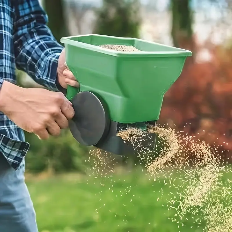 Portable Handheld Seed Dispenser - Sturdy Construction Plastic Manual Sower with Black Wheels, User-Friendly Design for Outdoor Lawn & Farm Gardening, Easy Seeding, Farms