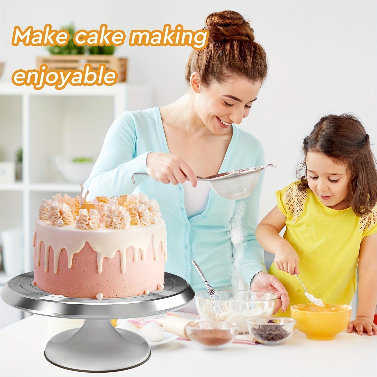 A 10-Inch Cake Turntable And Decoration Table in White And Pink, Designed for Home Baking, Featuring Rotating Tools for Cake Decorating