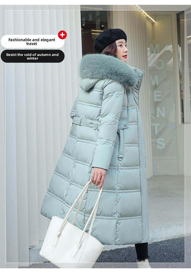 New winter women's thickened long over-the-knee hooded cotton-padded coat with large fur collar.