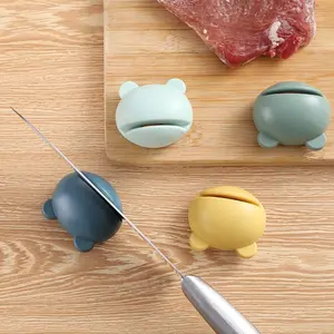 Cartoon frog & carrot styled knife sharpener, fast sharpening tool for kitchen knives and scissors. Compact portable design, handy daily gadget for home kitchen use.