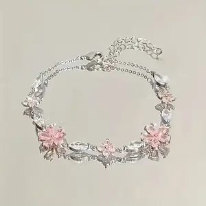 Adjustable Pink Cherry Blossom Bracelet - Elegant Bohemian style petal design, inlaid with sparkling synthetic zircon, delicate chain link jewelry, suitable for daily wear and gift giving, women's jewelry, exquisite craftsmanship