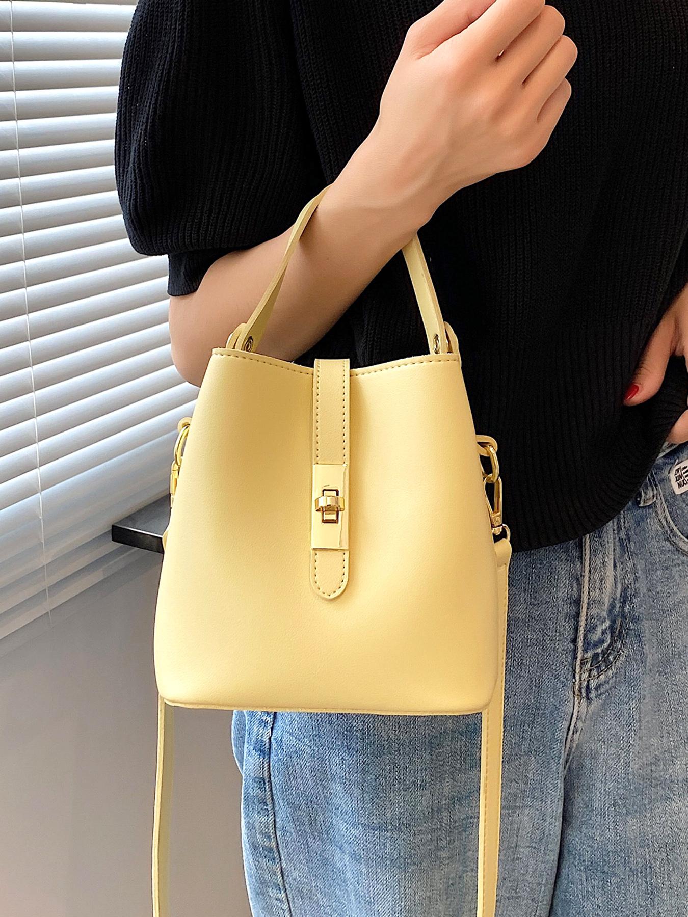 Niche design bucket crossbody bag, simple textured metal buckle decorated single shoulder crossbody handbag, fashionable and versatile daily commuting essential item, large capacity suitable for office workers, shopping, etc.