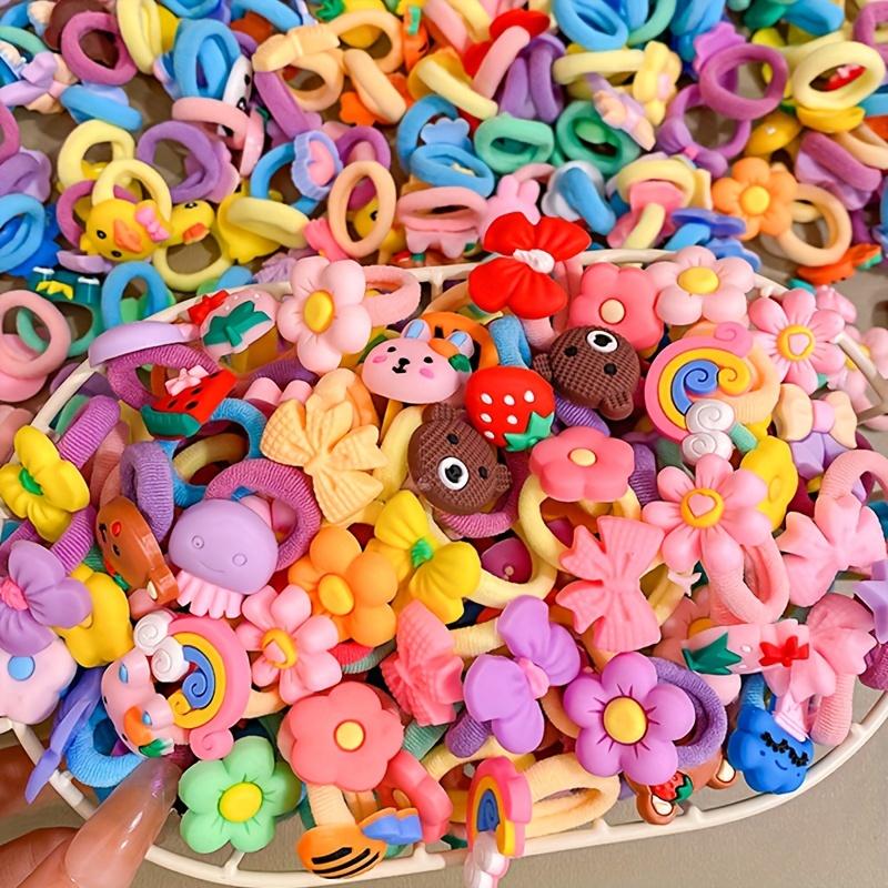 Baby Hairband Set! Available in packs of 50/80/120 pieces. Cartoon fruits, vegetables, animals, and flowers with bows. Plastic material, various colors