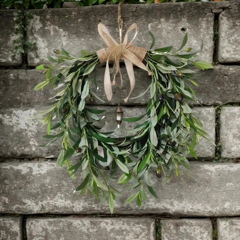 Artificial olive branch wreath with fruits and flowers - a natural-style wreath suitable for walls, doors, windows, and home decoration.