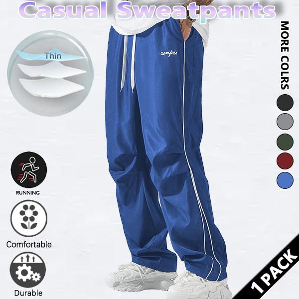 Loose-fitting sweatpants for men, grey side stripes with gold accent stripes, comfortable design, sports casual style bottoms, sweatpants, fitness wear, today's fashion outfit Loose-fitting sweatpants for men, grey side stripes with gold accent stripes, comfortable design, sports casual style bottoms, sweatpants, fitness wear, today's fashion outfit