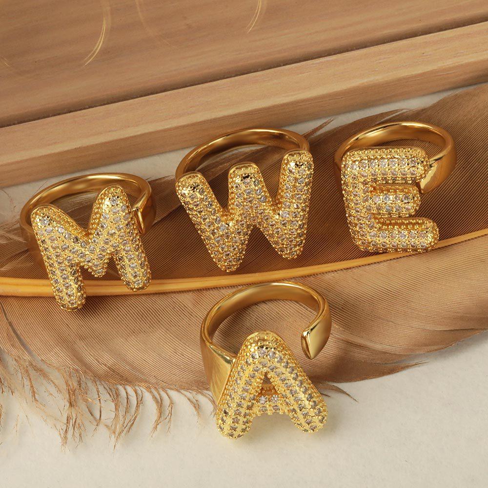 Versatile 26-letter ring with copper inlay and zirconia, open design, niche light luxury, non-fading jewelry for women