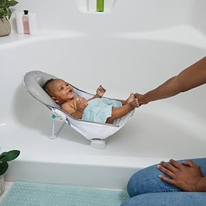 Foldaway 2-Position Baby Bath Seat, Adjustable Support for Sink or Bathtub, Ages 0-6 Months up to 20 Pounds, Machine-Washable Sling Foldaway 2-Position Baby Bath Seat, Adjustable Support for Sink or Bathtub, Ages 0-6 Months up to 20 Pounds, Machine-Washable Sling