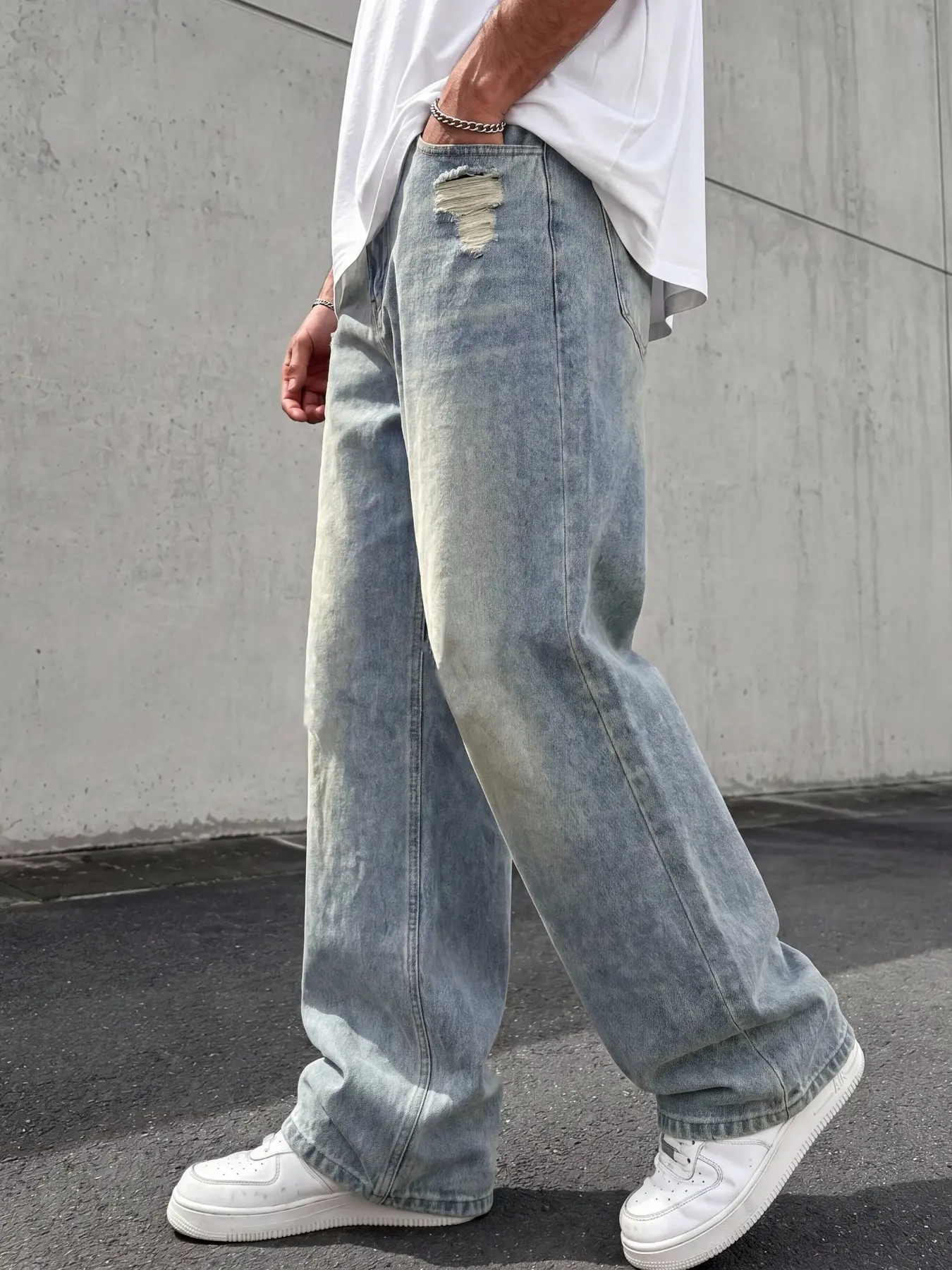 Men's all-season ripped loose wide-leg Jean denim pants, featuring localized ripped frayed detailing, vintage faded craftsmanship, comfortable and versatile, suitable for daily outfits