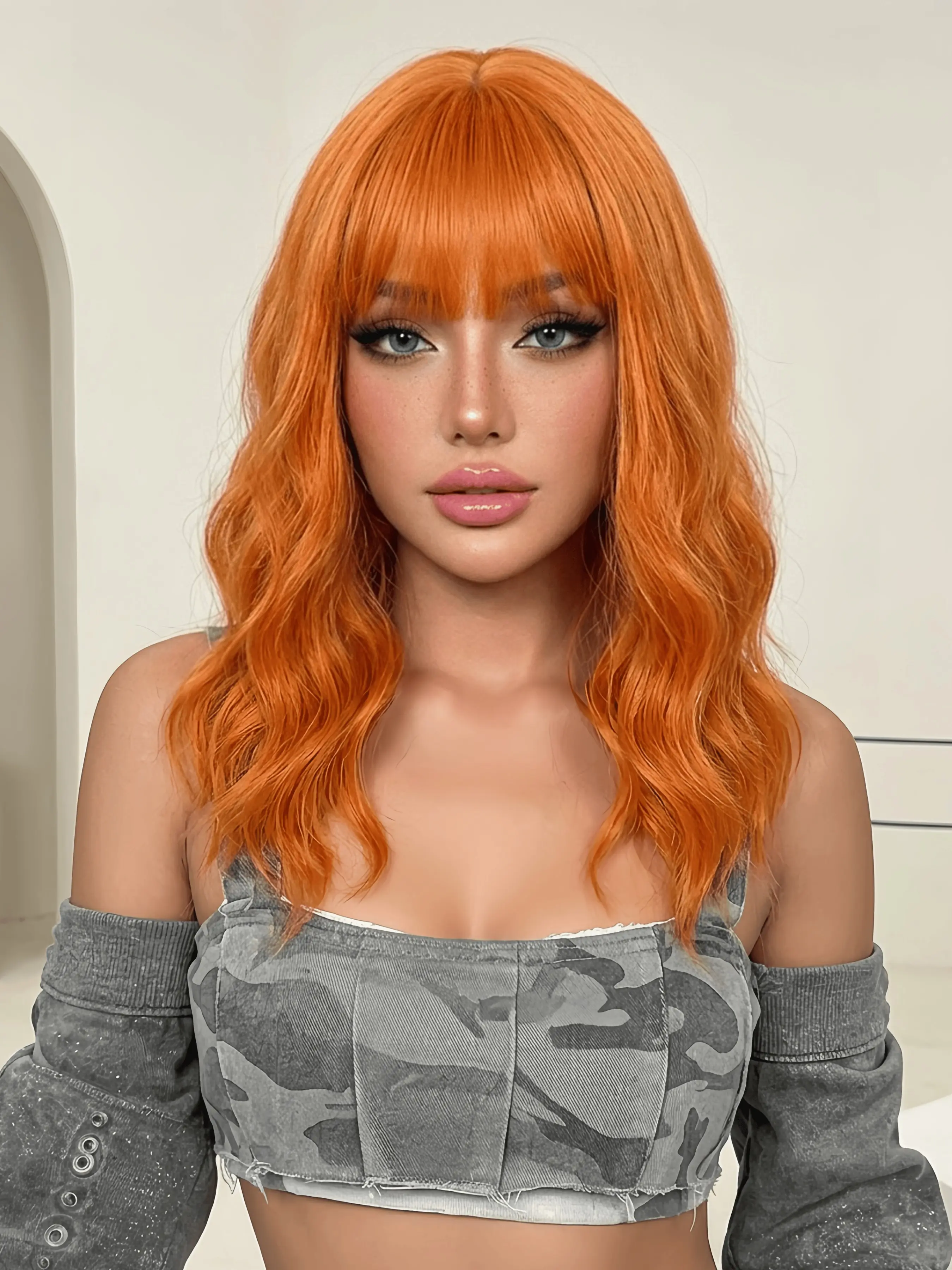 14inch Vibrant Ginger Orange Wavy Wig with Bangs - Shoulder Length Synthetic Hair, Soft Beach Waves, Full Blunt Fringe, Heat Resistant & Glueless for Fashion, Parties, and Daily Glamour
