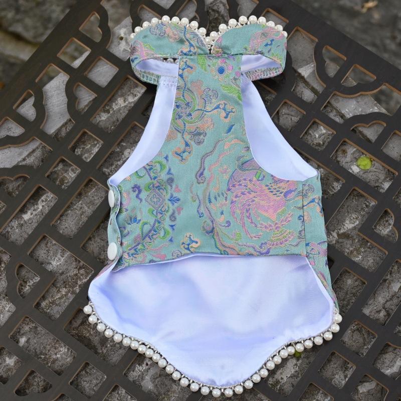 Paws Trendy Pet Spring & Summer Qipao for Dogs & Cats, suitable for Teddy, Bichon Frise and other small dogs. Features embossed fabric with exquisite retro frog buttons, fine workmanship, exuding noble elegance and making your beloved pet stand out.