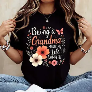 Being A Grandma Makes My Life Complete Floral Butterfly Print T Shirt Black Casual Loose Fit Tee For Women Perfect For Everyday Wear And Leisure Activities