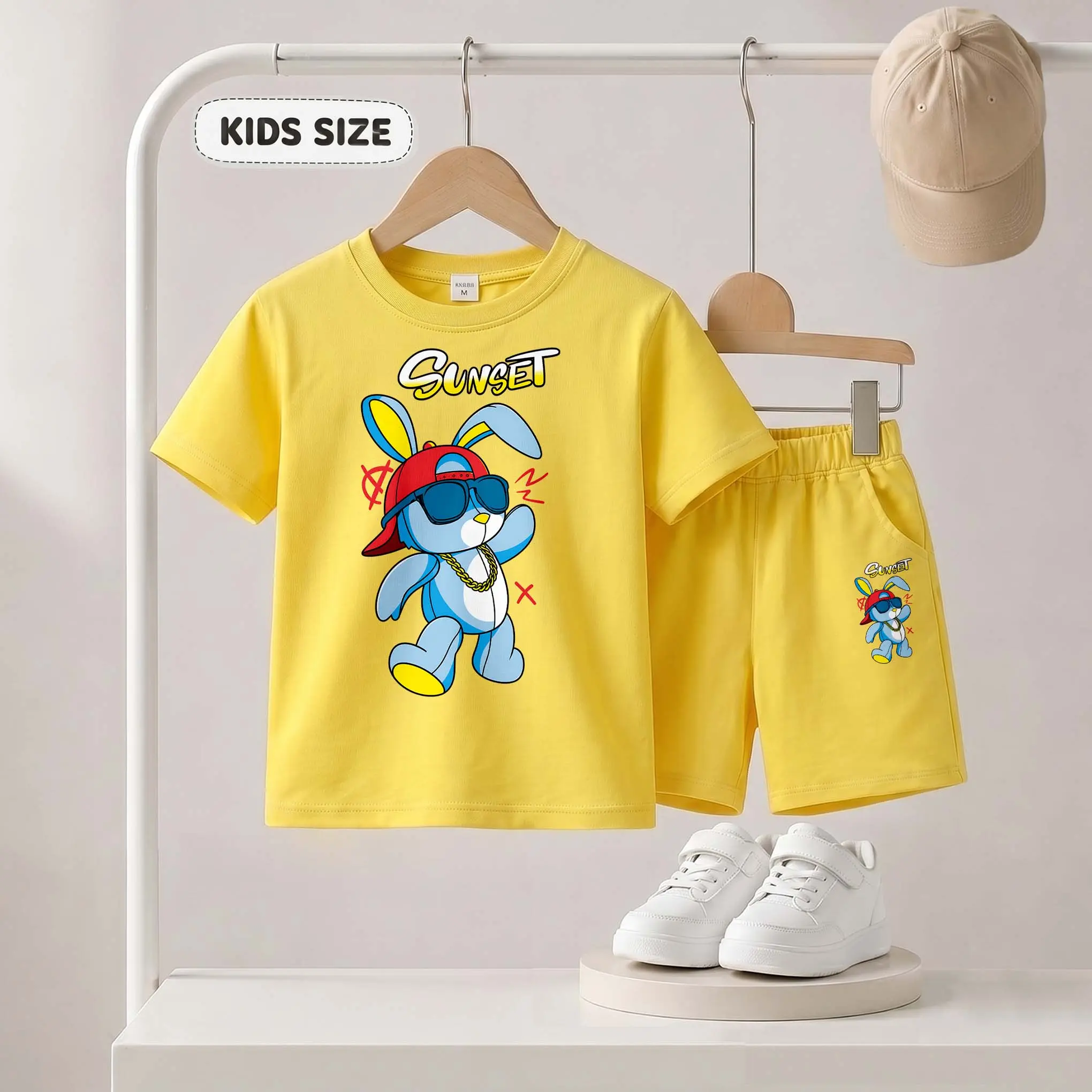 Kids’ Cartoon Rapping Rabbit Print Short-Sleeve T-Shirt And Shorts Set—Casual Summer Kids' Clothing. This Round-Neck Outfit Combination Is Perfect For Everyday Wear And Outdoor Play.