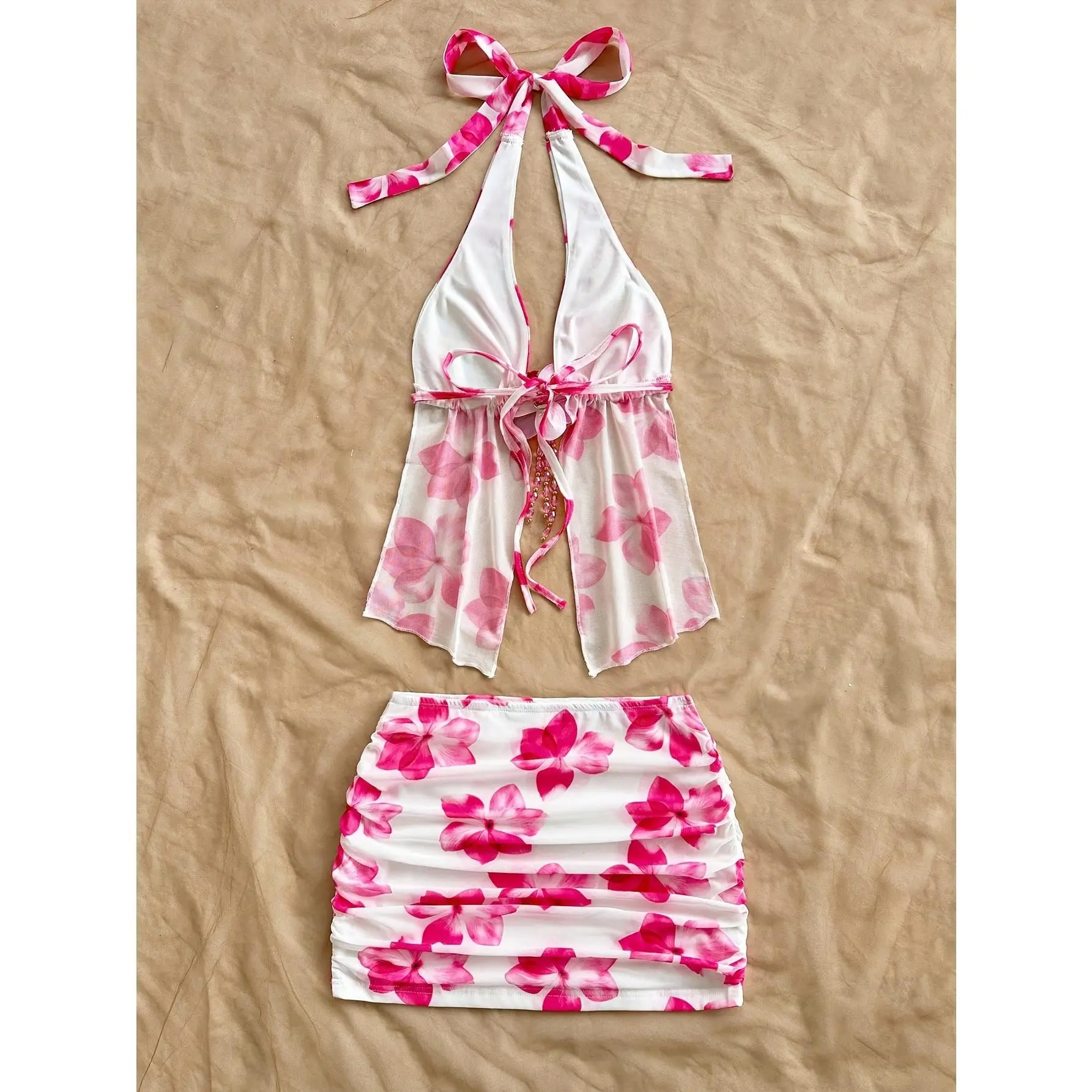 2026Women's resort-style printed knitted mesh backless tie-up 3D floral camisole and pleated mini skirt set, suitable the beach, vacation, bohemian two-piece beach dress set, printed two-piece beach dress set