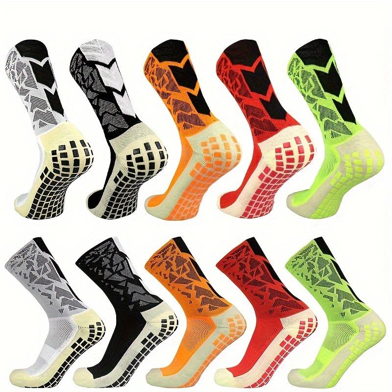 A Pair of Men'S Mid-Calf Football Socks, Designed with a Thick Towel Bottom for Enhanced Grip And Durability