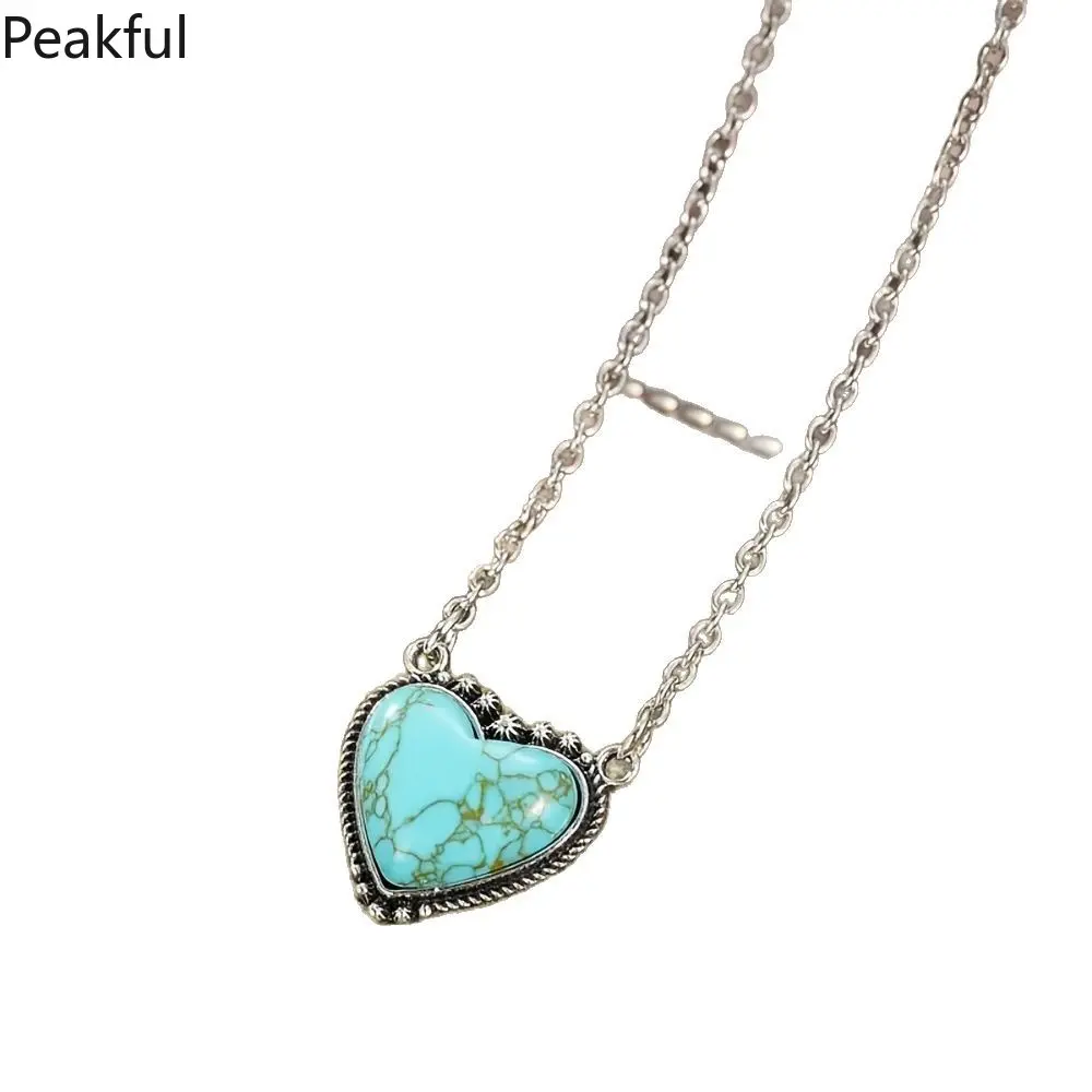 Women’s statement necklaces | Viral turquoise heart pendant necklace with silver chain | Niche western-style boho necklace with sunburst accents | Large natural turquoise stone, vintage silver finish, perfect for cowboy outfits, everyday wear and festival