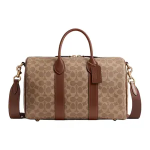Coach Compass 35 Bowling Bag for Women – Saffron Brown with Gold-Tone Hardware
