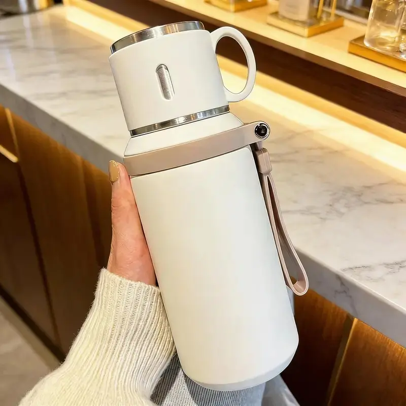 20oz Portable Carry Strap Insulated Water Bottle with Cup Lid, Cleanable Stainless Steel Flask for Hot & Cold Beverages, Multipurpose Daily Drinkware for Commute, Office and Camping, Nice Present for Her