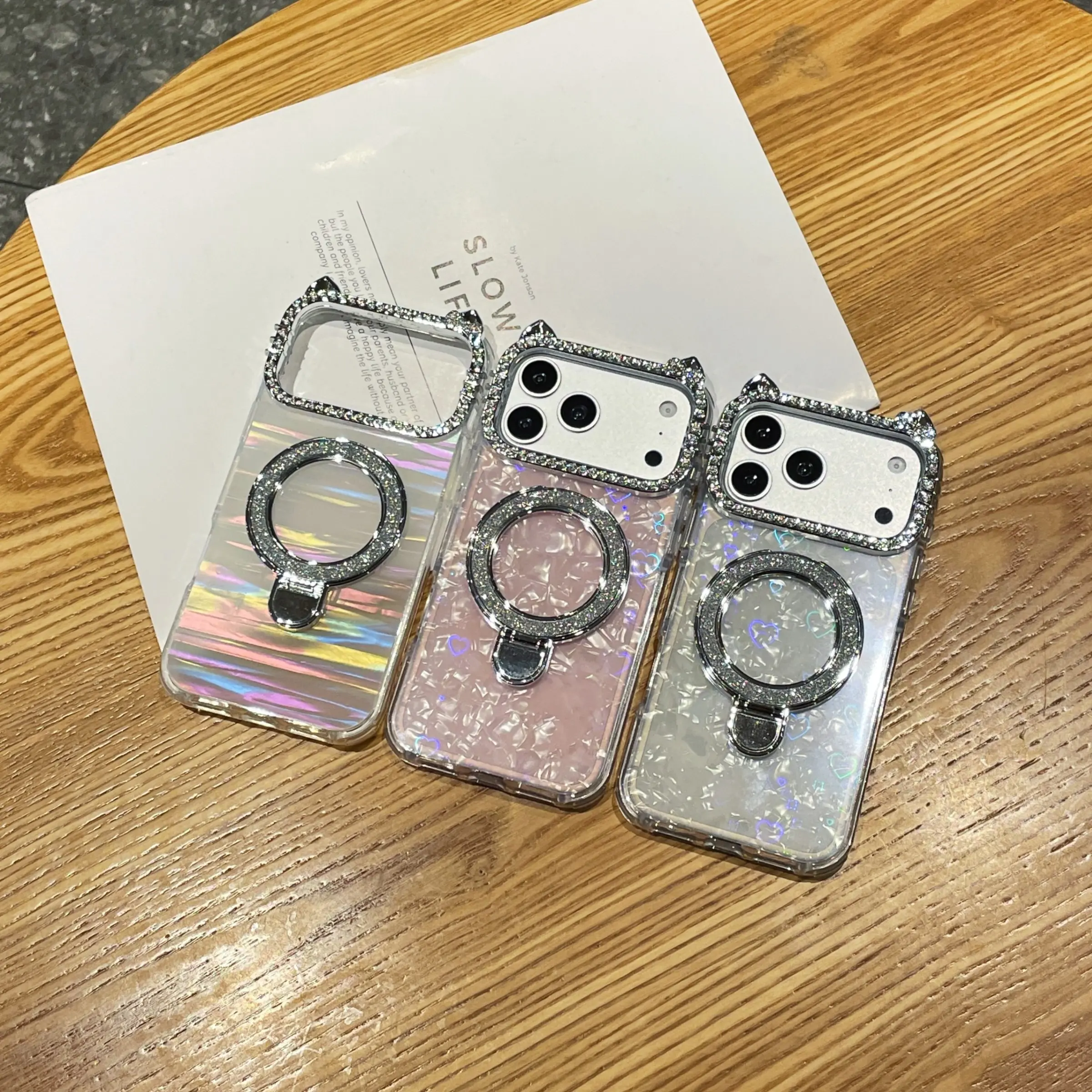 New Style Hello Kitty Camera Lens Frame, 3D Heart Shell Pattern Glitter Kickstand Phone Case for iPhone 17, Premium Women's Protective Case Compatible with iPhone 16 Pro Max / 15 Plus / 14 / 13, Cover