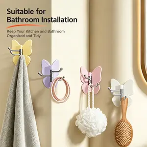 Rotating Butterfly Hooks – Strong Adhesive Wall Organizer for Towels, Bags, Hats & Keys,No Drilling Required,Random Color.