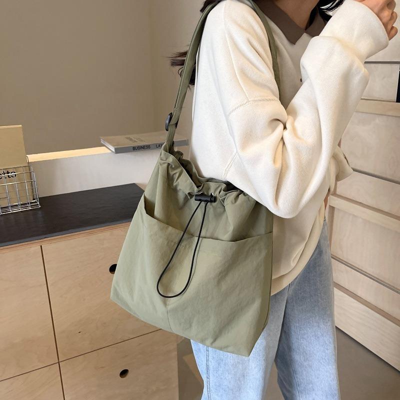 Casual fitness bag, new Korean-style casual crossbody bag, street-style simple shoulder commuter bag, bucket bag for women tote handbags luxury designer real