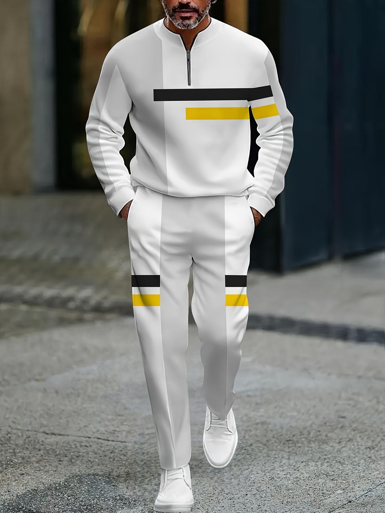 The new men's color-blocked sports suit, featuring a white half-zip sweater paired with matching trousers, is adorned with black and yellow stripes, exuding a trendy vibe. The fabric is comfortable and skin-friendly, suitable for daily commuting and casua