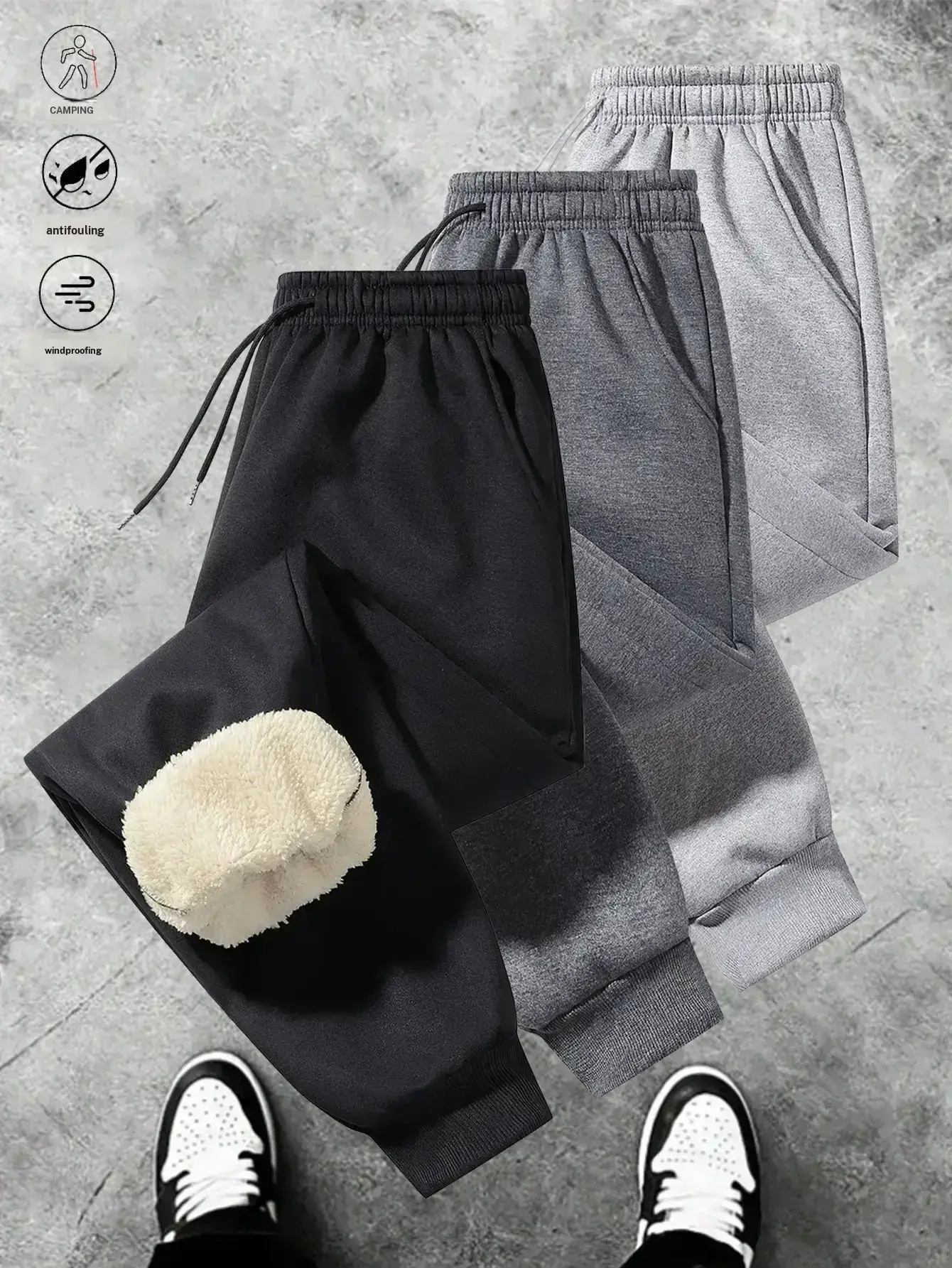 Three stripe athletic jogger pants, featuring a minimalist style with a drawstring waistband, practical aesthetic, ankle cuffs for a clean finish, and inner fleece for soft comfort. Suitable for daily commuting and outdoor strolls, these pants offer versa