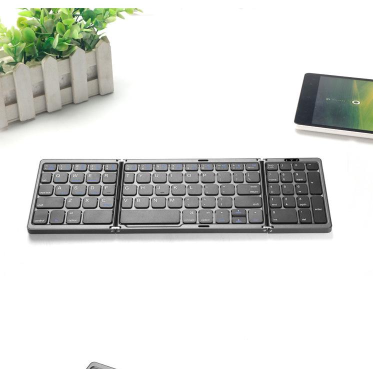 Bluetooth folding keyboard with numeric keypad, mini portable silent keyboard, universal keyboard for mobile phones and tablets