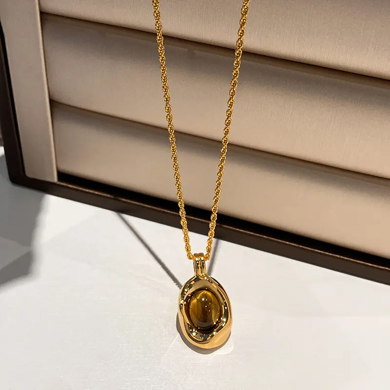 Tiger's Eye Jewelry Set: Vintage-style pendant necklace with an irregular, molten-look design and luxurious gold-plated chunky stud earrings—a stylish, eye-catching crystal accessory set and an exquisite gift for women.