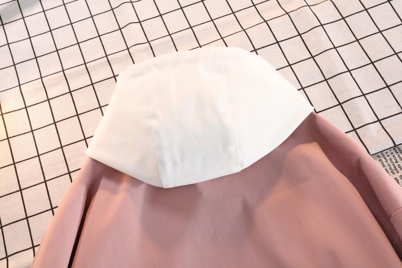 A hooded letter jacket, featuring a casual and simple style. The hooded design is sleek and elegant, while the overall design is practical and versatile. The letter embroidery adds a touch of sophistication, and the striped accent at the cuffs completes t