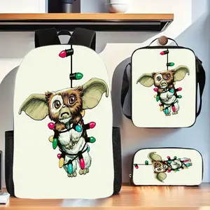 Little Monster Gizmo's three-piece school bag set with Christmas lights and beige background includes a backpack, insulated lunch bag, and stationery storage bag, suitable for daily use by teenagers