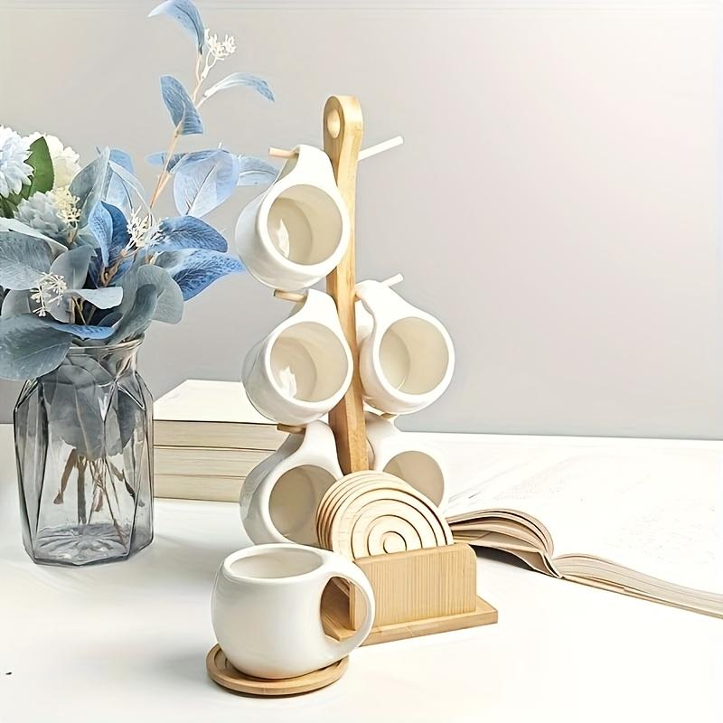 Faridabio 1 Set of Mug Stand And Coaster Set Includes a Ceramic Coffee Cup And Saucer, Perfect for Coffee Shops. This Set Features a Mug, a Coaster, And a Cup Holder, with Each Cup Holding 200Ml Or 7 Oz