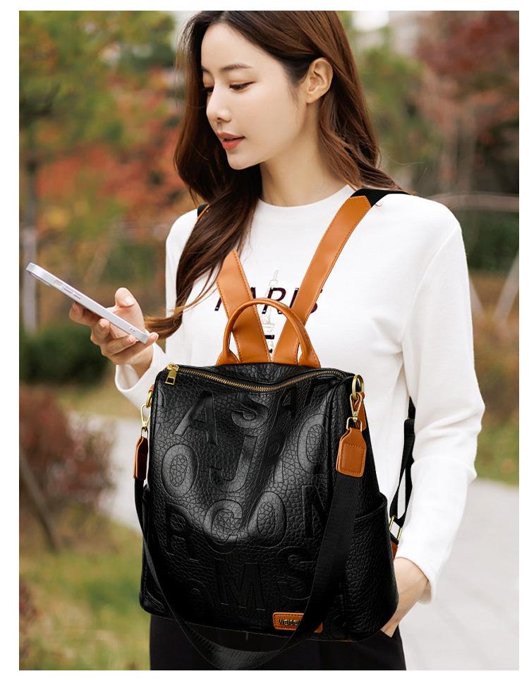 Embossed large-letter backpack, 2026 popular color-blocking multi-functional travel backpack, textured soft leather school bag for female students