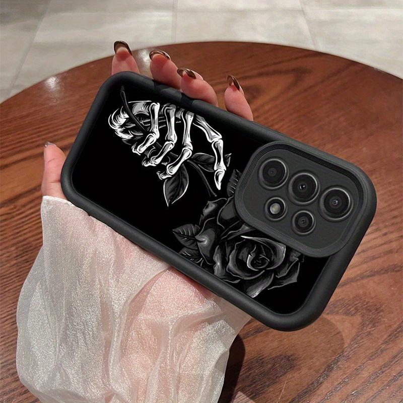 A Phone Case Featuring a Skeleton Hand Holding a Black Rose, Compatible with Various Galaxy Models Including Samsung Galaxy S26 S25 S24 S23 S22 S21 Fe Plus Ultra A13 A14 A15 A16 A17 A33 A34 A35 A36 A52 A53 A54 Note20, And Several Others.