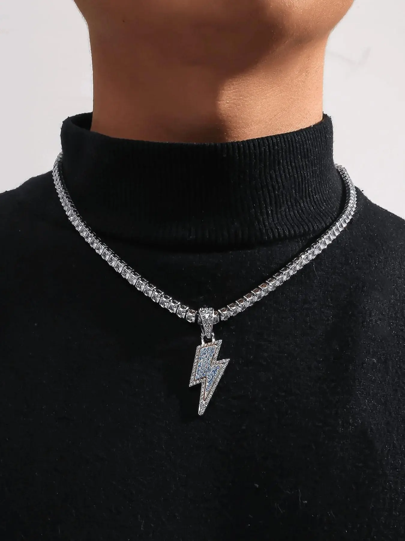 🔥｜Game changer for your jewelry collection. Two-tone lightning tennis chain that stands out everywhere. 💎 Bling for every occasion. #streetwearfashion #lightningnecklace #y2kjewelry #musthave