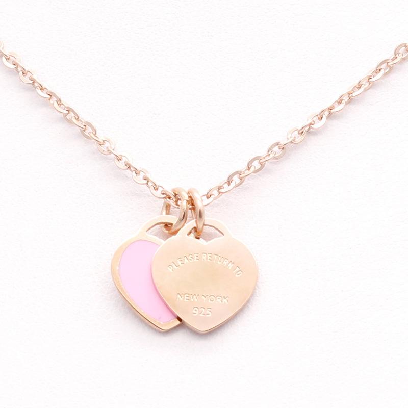 New luxury enamel pink double heart necklace, gold titanium steel, versatile new style