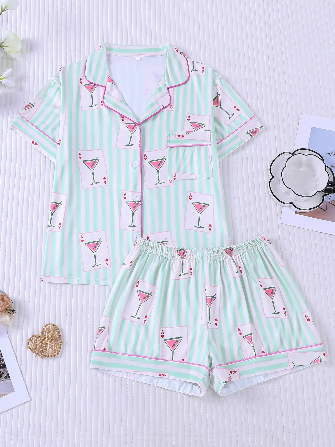 Women's 2-piece pajama set, mint green white vertical stripes with poker cocktail glass print, fresh trendy casual style. Hot pink piping lapel short sleeve top with pocket, matching shorts, soft fabric, elastic waist, all-season women loungewear