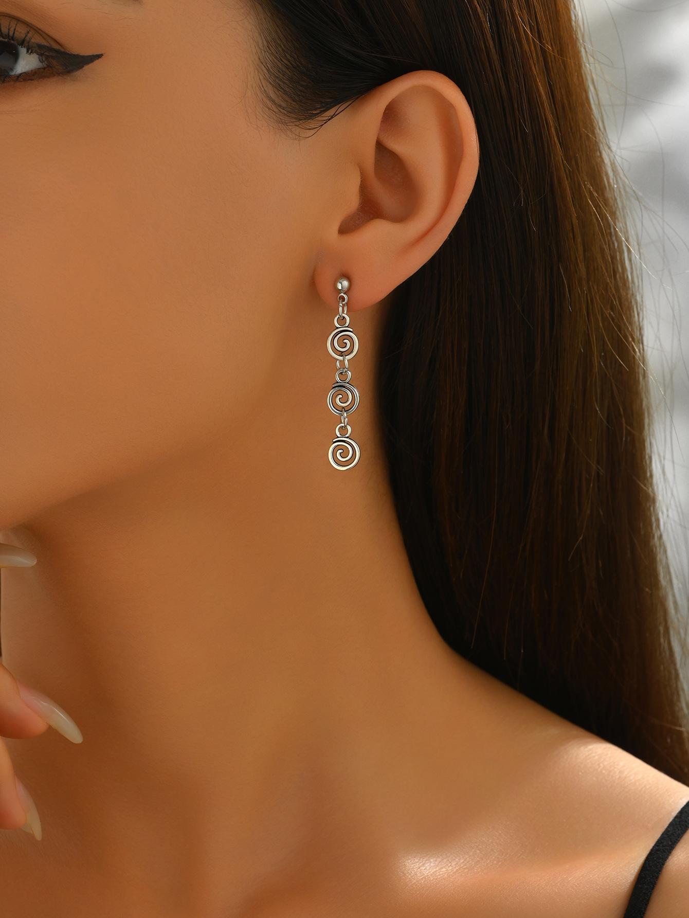 Vintage spiral earrings with distressed design, mosquito incense holder pendant, swirling long fringed earrings