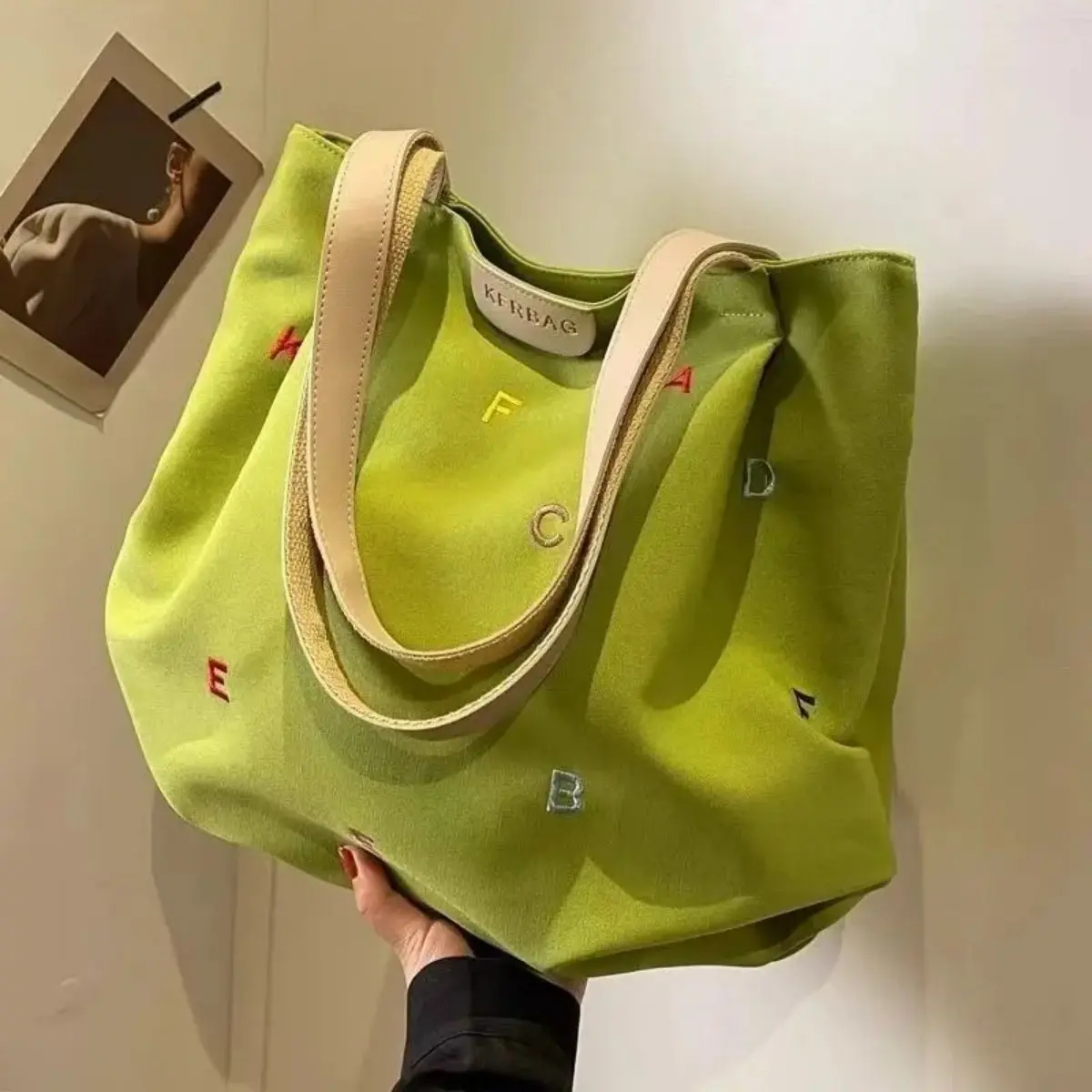 Embroidered Letter Canvas Tote Bag, large capacity and versatile. Stylish one-shoulder design with personalized letter embroidery for daily wear. tiktokshopbacktoschool