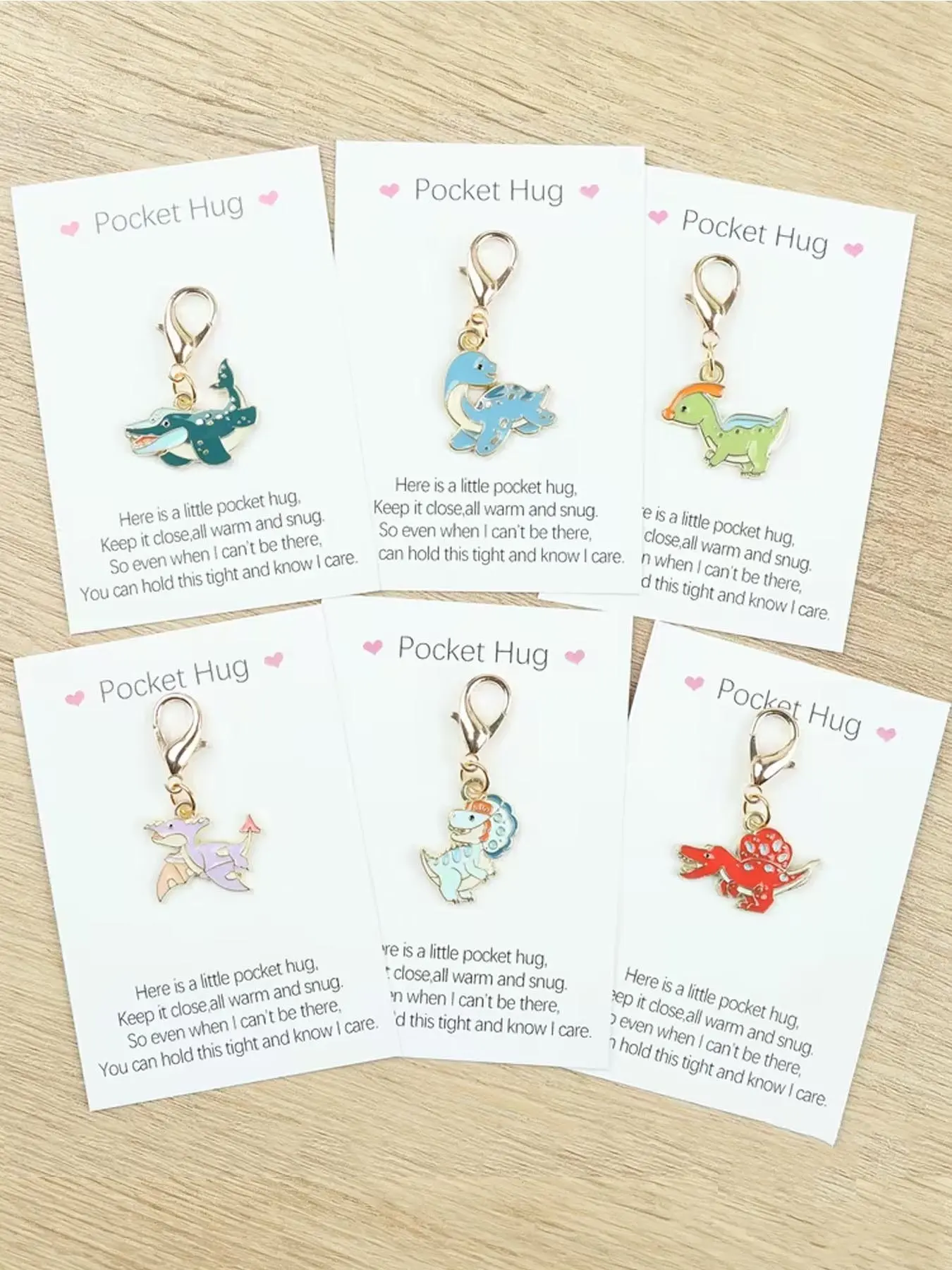 6pcs/12pcs Unique Dinosaur Keychains Ornaments, Keychain Set, With Warm "Pocket Hug" Greetings, Are Very Suitable For Matching Bags and Cars,      As Birthday, Party Gifts, And Gifts For Friends, Halloween, And Christmas