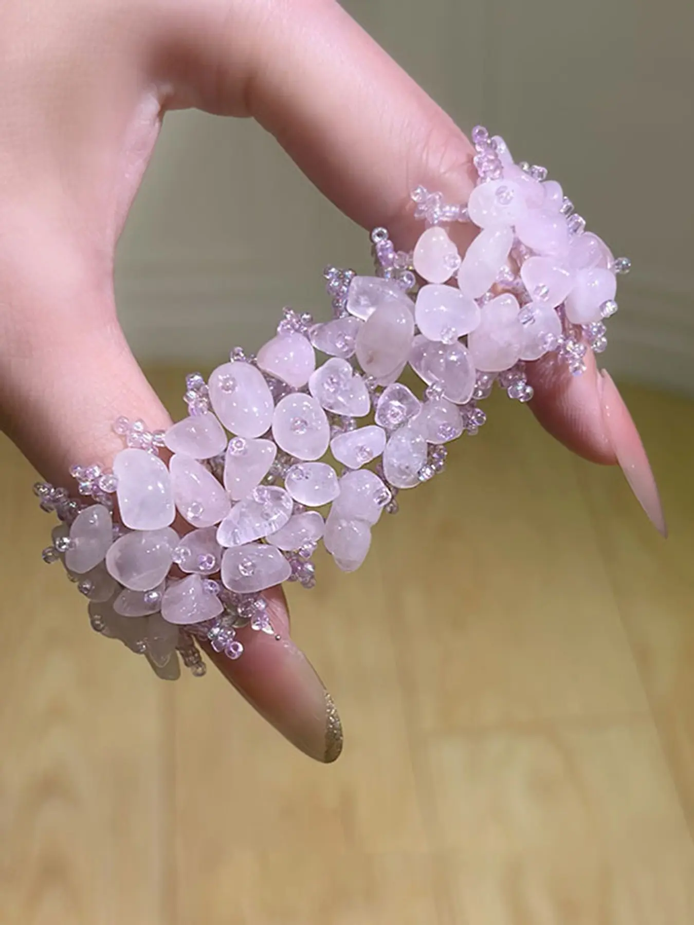 Wisteria-inspired chip stone bracelet featuring hand-polished stones and an intricate woven design; a vibrant, bohemian-style beaded bracelet blending "New Chinese Style" elegance with a soft, ethereal, and vintage aesthetic.
